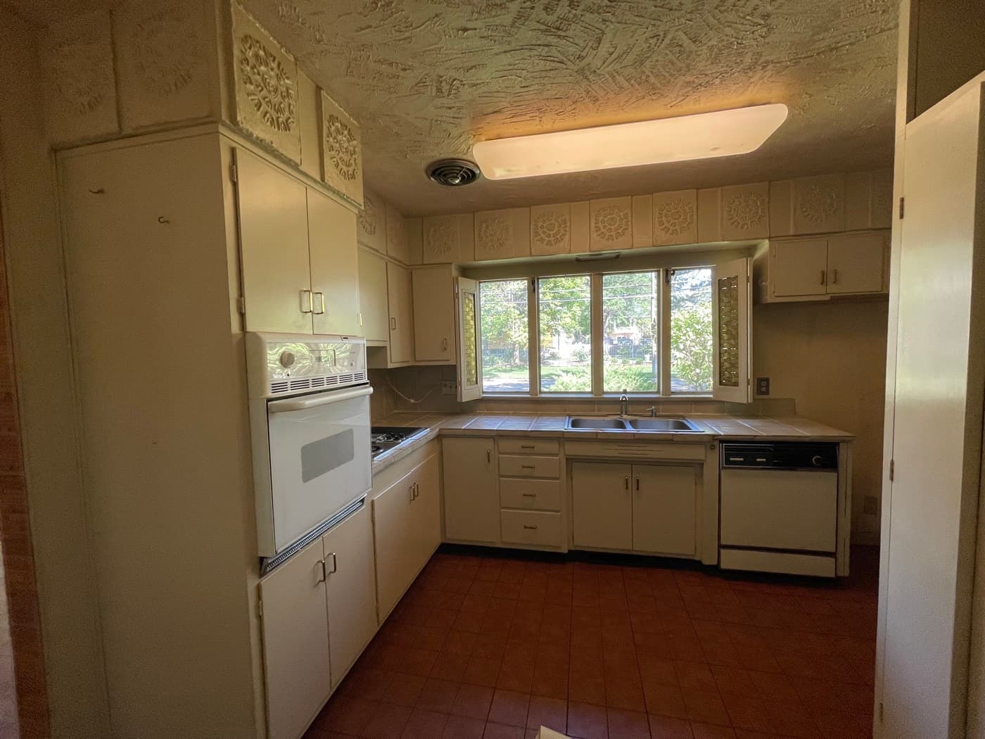 Kitchen before — Acorn Properties renovation