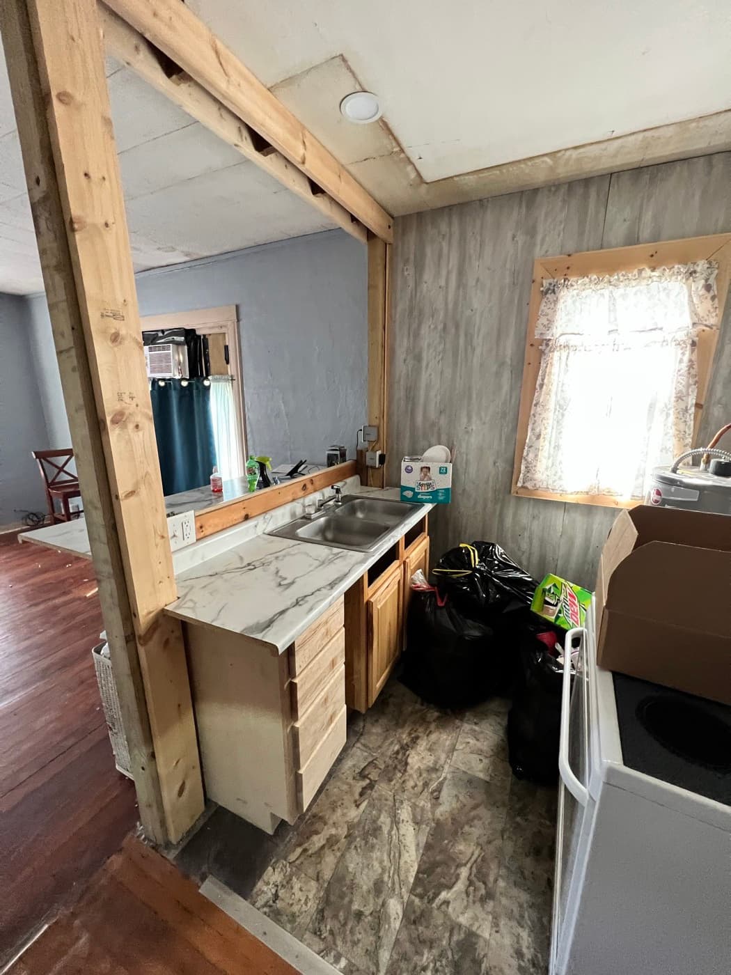 Kitchen before — Acorn Properties renovation