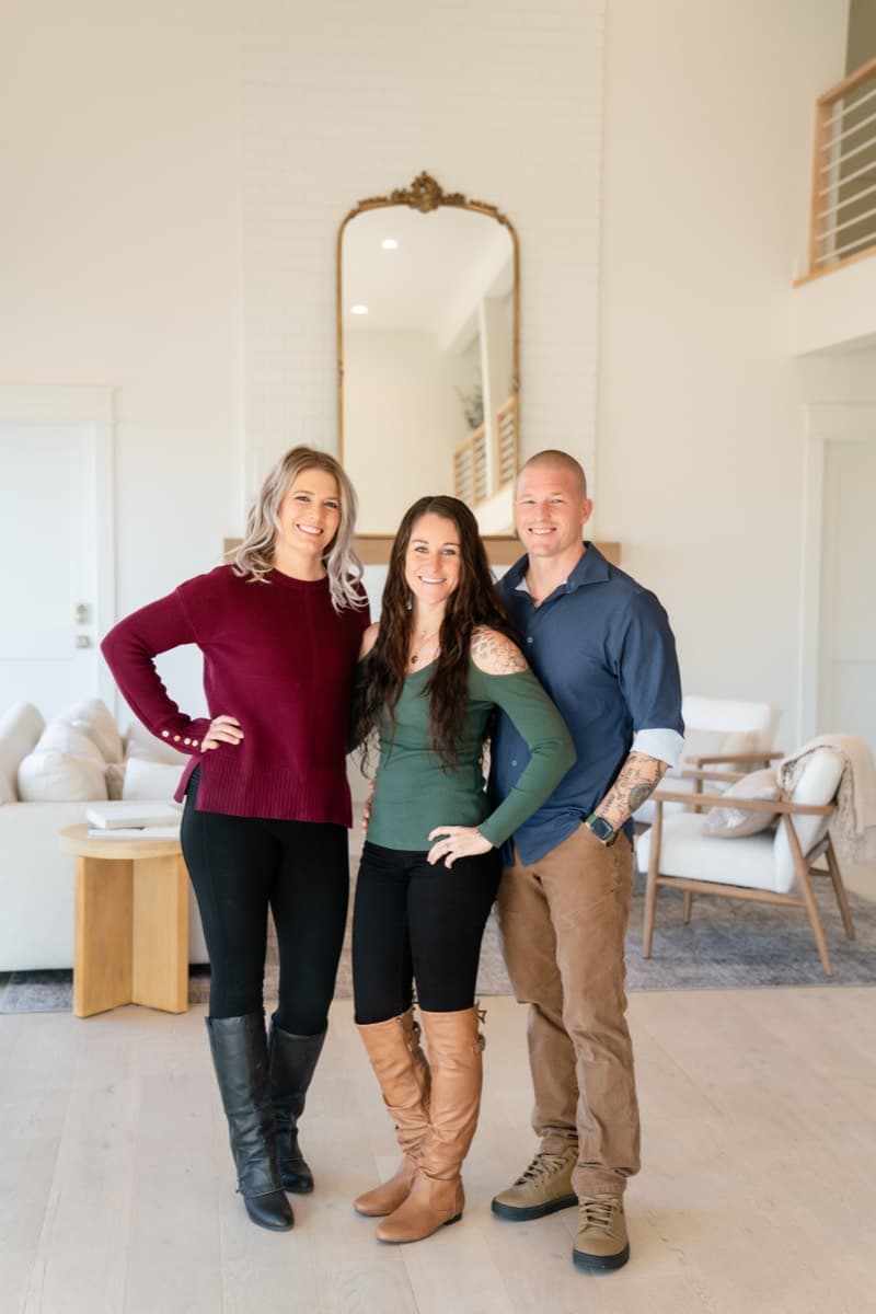 The Acorn Properties team — Megan, Jeff, and Natasha